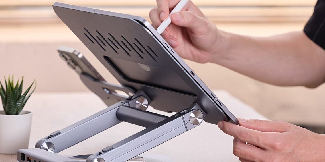 Organisez votre espace de travail avec ce support pivotant à 360 degrés pour ordinateur portable et concentrateur. - plare. Organisez votre espace de travail avec ce support pivotant à 360 degrés pour ordinateur portable et concentrateur.